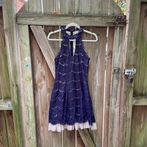 Francesca’s beautiful sleeveless lace dress